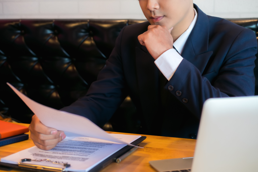 HR professional reviewing workplace drug testing policy to ensure compliance with Idaho law